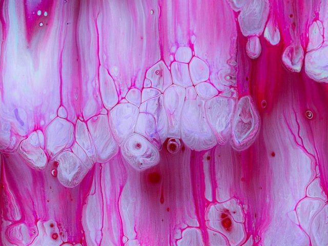 Розовая краска жидкие художественные пятна абстракция