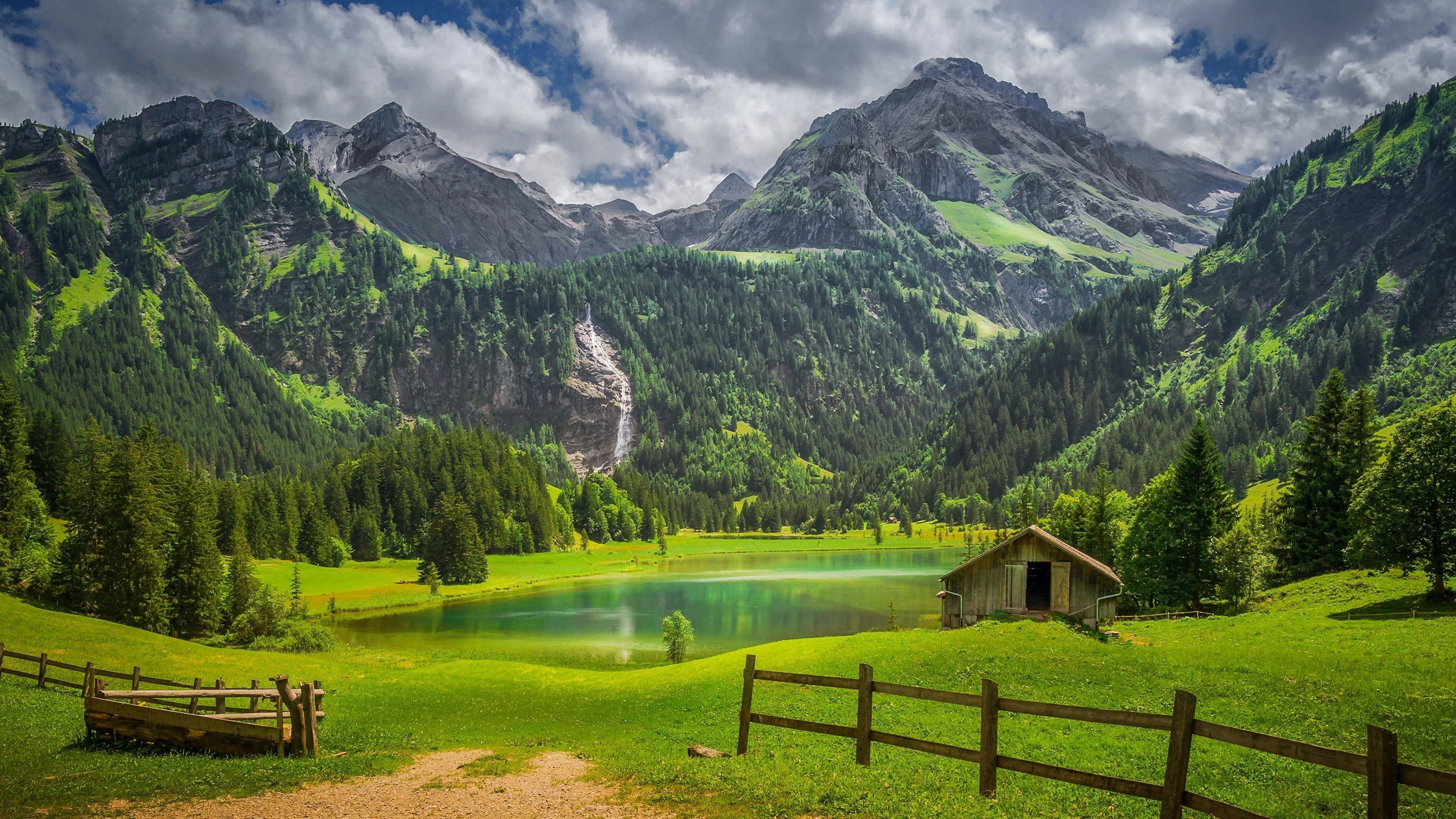 Альпы забор лес озеро Швейцария водопад природа обои скачать